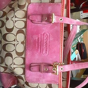 A medium sized coach bag